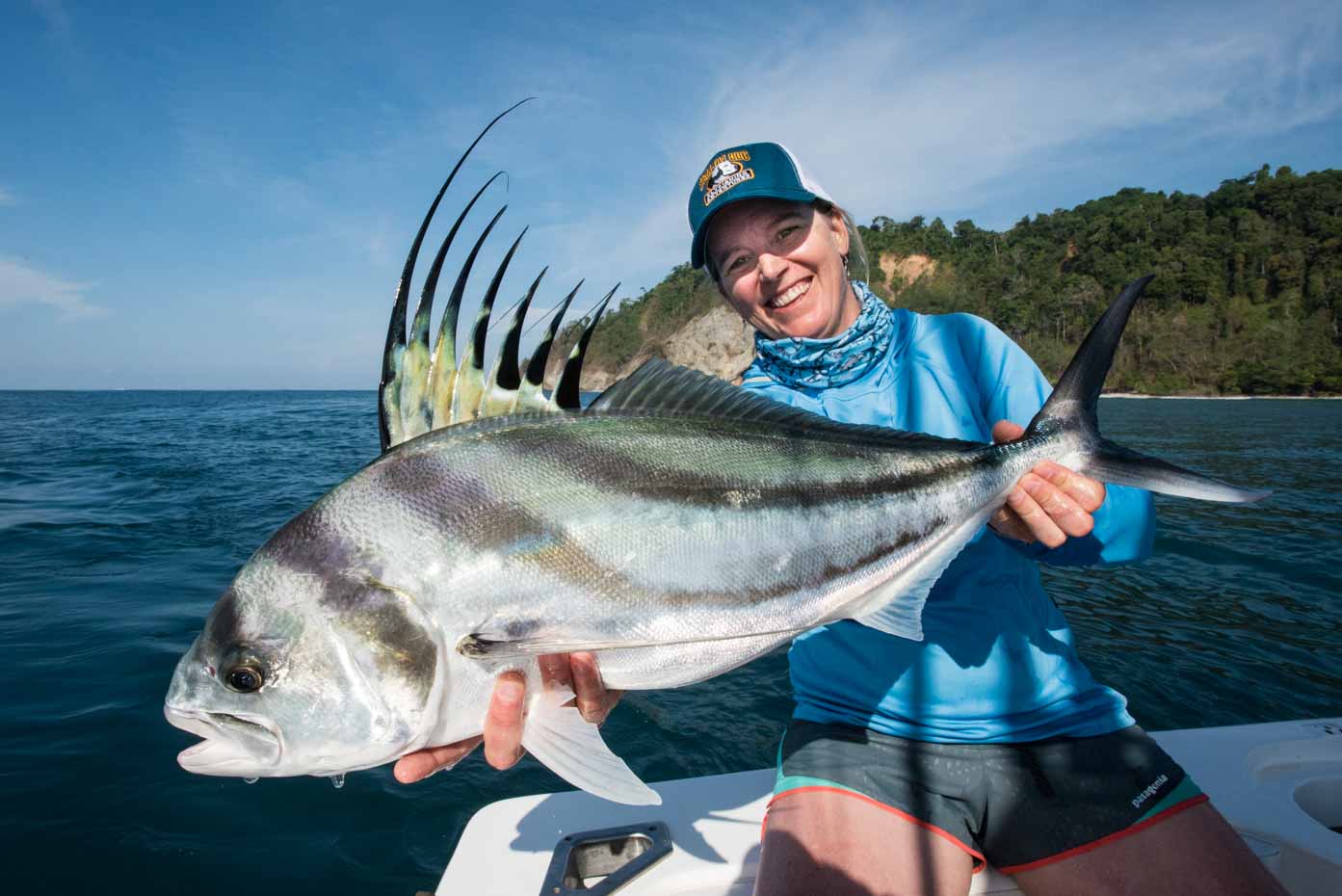 Angler catching a roosterfish near Quepos, Costa Rica